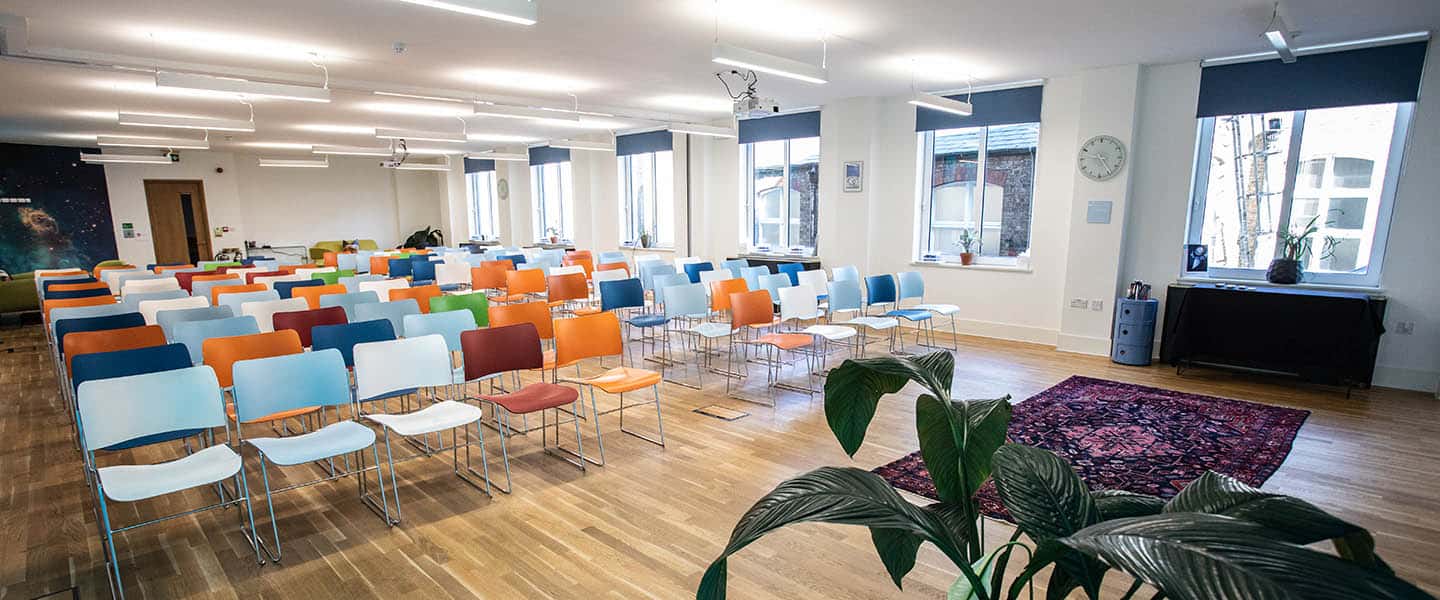 large conference space with tech