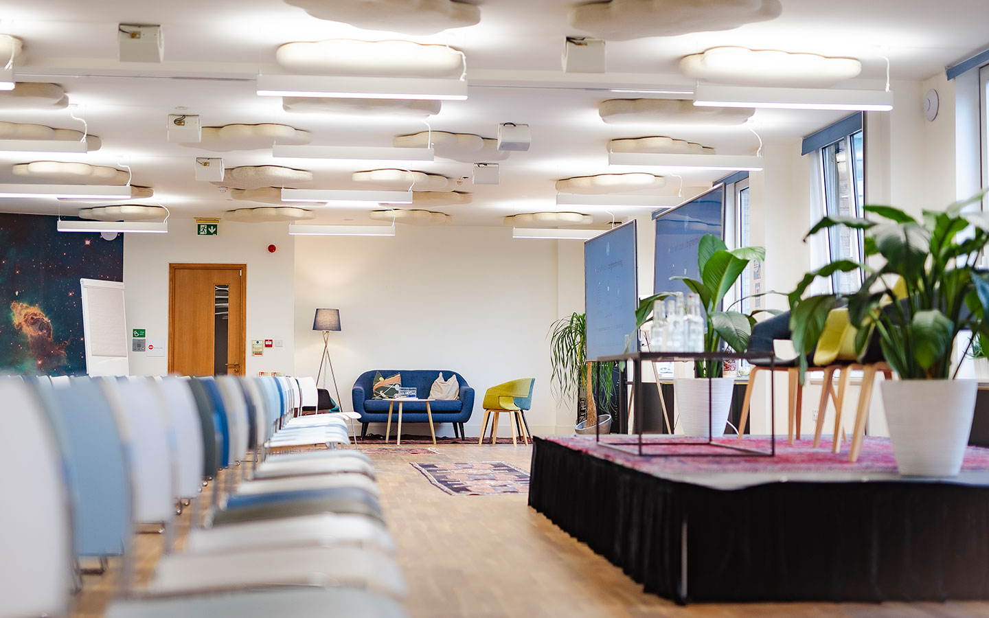 Versatile Apollo Soyuz event space with cabaret-style seating and stage