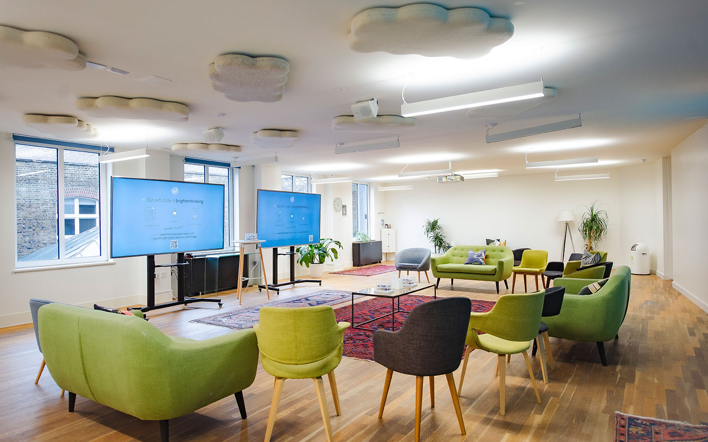 Large meeting space equipped with beautiful bright soft seating near London Liverpool Street